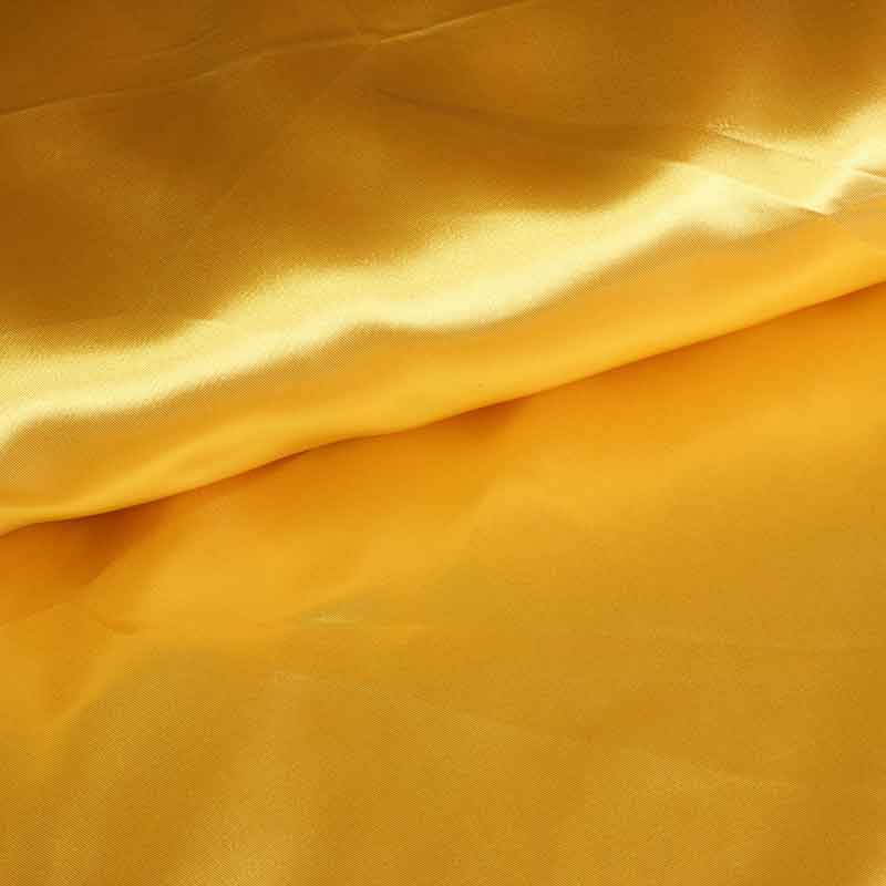 Satinstoff gold
