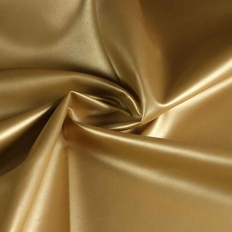 Kunstleder stoff gold