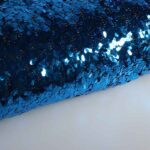 Mesh stof met druppels aqua