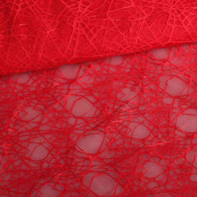 Spinnenweb-Spitze rot