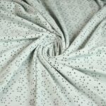 Jersey broderie stof oud groen